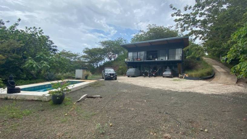 casa-con-piscina-y-vista-panoramica-a-las-montanas-de-tamarindo-y-playa-grande-big-0